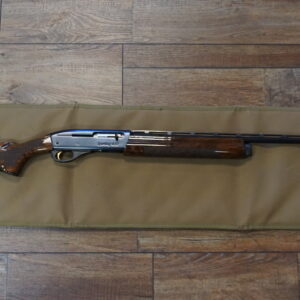 Remington 1100 Sporting .410 gauge 27" barrel with shortened stock and Decelerator rubber recoil pad — used excellent
