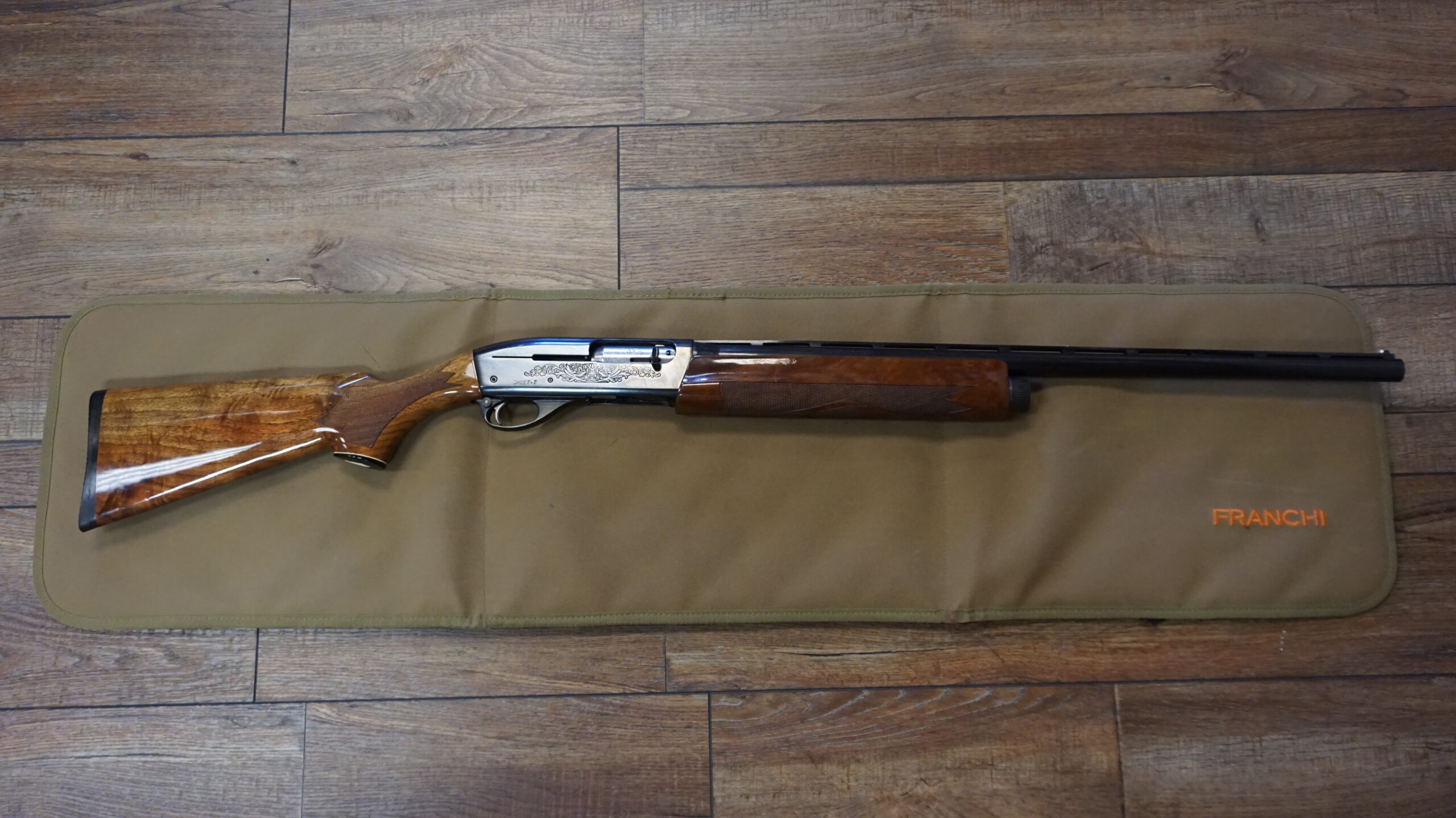 Remington 1100 Skeet 12GA 25" barrel with highly figured stock and Rubber Pachmayr pad — used very good