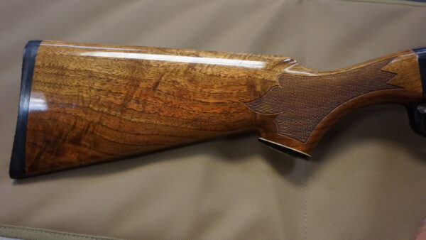 Remington 1100 Skeet 12GA 25" barrel with highly figured stock and Rubber Pachmayr pad