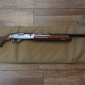 Remington 1100 Sporting .28 gauge 27" barrel with Remington rubber recoil pad and original box — used excellent