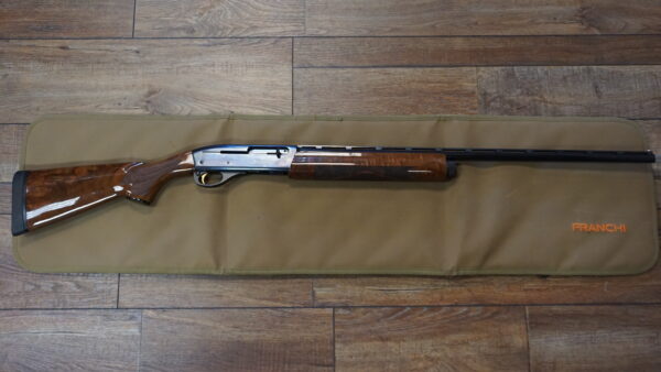 Remington 1100 Sporting Used Remington 1100 Sporting .28 gauge 27" barrel with Remington rubber recoil pad and original box — used excellent