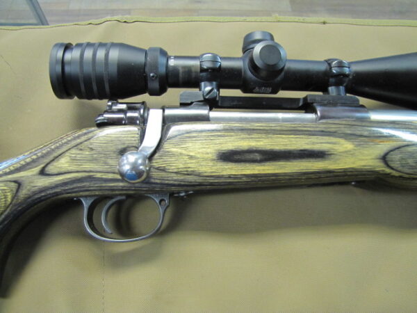 Custom Mauser-action 7mm-08 rifle with 24" barrel, Fajen stock and Redfield 6–18x44 scope